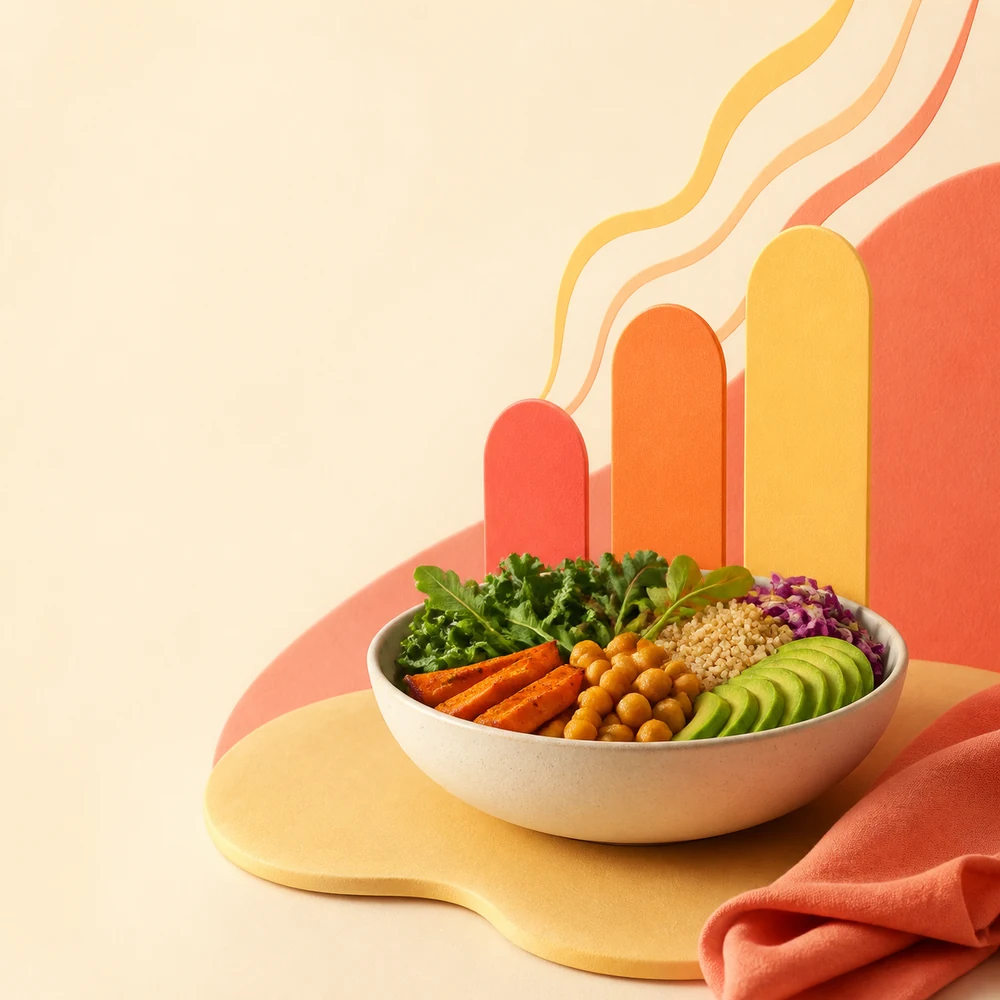 A colorful grain and vegetable bowl beside three warm rising energy shapes.